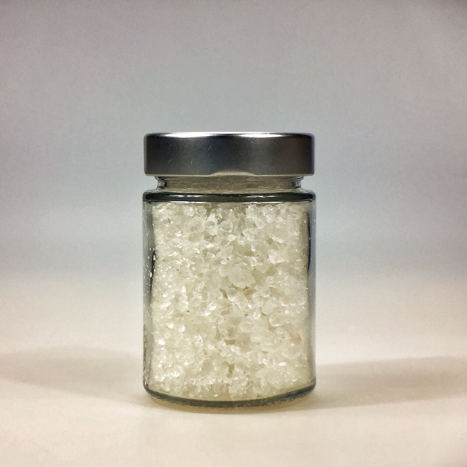Halit Salz grob gemahlen für Salzmühle im kleinen Glas mit Silberdeckel